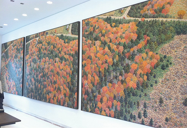 Art of fall colored trees on a wall
