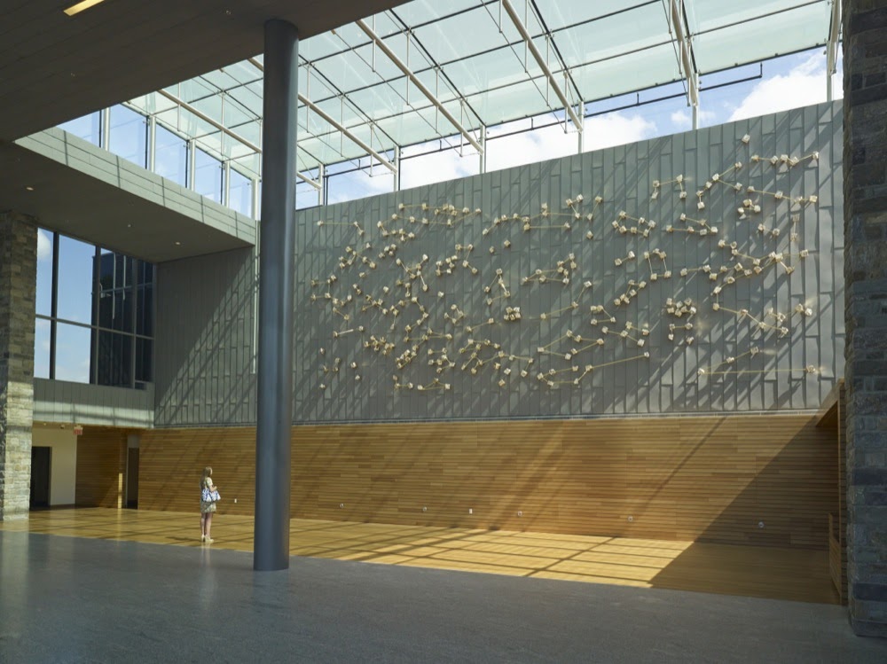 A landscape view of Nocturnal (Navigation), by Teresita Fernández, showing 300 constellation points that resemble crystallized minerals and patterned after a navigational star chart.