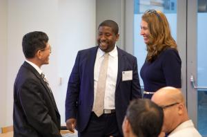 GSA's Small Business Utilization Associate Administrator Exodie Roe III speaks with business leaders