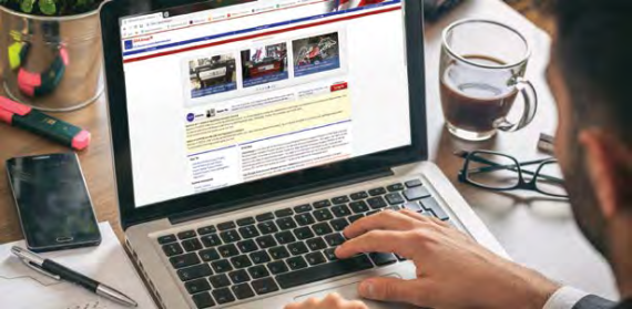 A person viewing the GSA Xcess Website on a computer