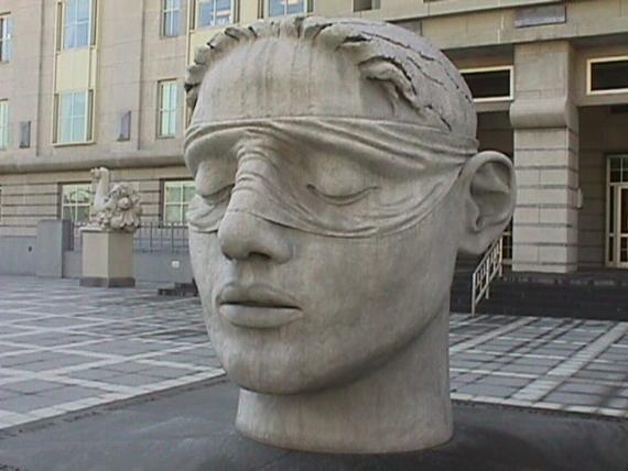 Head of Justice statue outside front entrance of the Martin Luther King