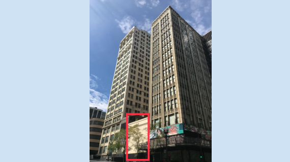 Long-shot of 202-220 S. State Street federal facilities including a red box around the 208-12 three-story building