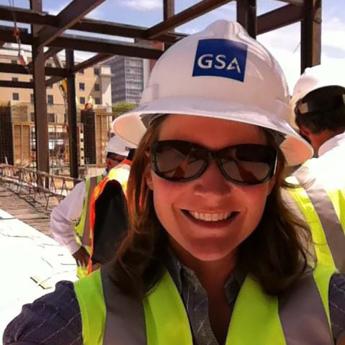 White woman wearing hard hat