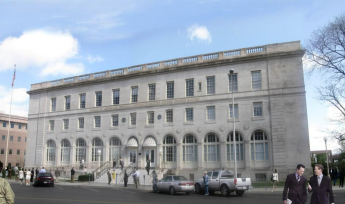 Wayne Aspinall Federal Building &amp; U.S. Courthouse. A three story historic building with a white marble façade.