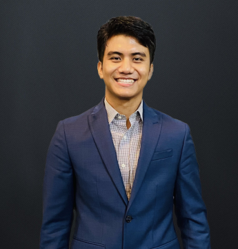 Chanuk Thang in business suit and collared shirt.