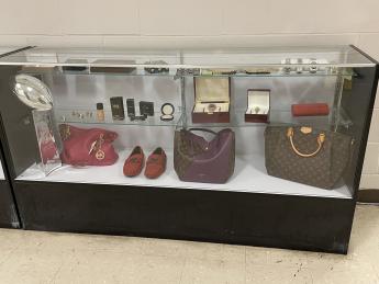 Display of various counterfeit merchandise at the JFK International Airport in Queens