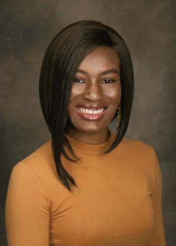 Kierra Taylor wearing short neck, long-sleeved shirt. 